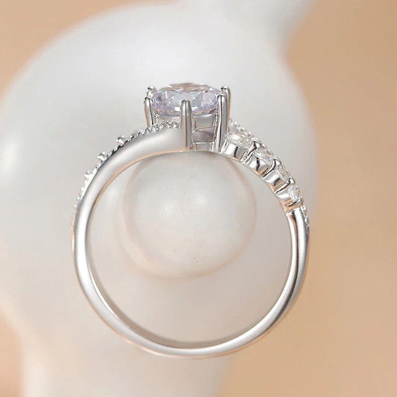 Gladys Round Moissanite Ring