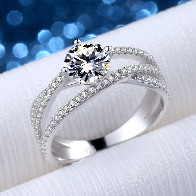 Embrace Round Moissanite Ring